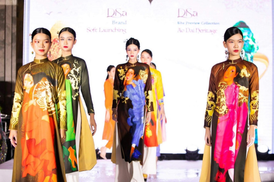 Ao dai designs of the designer Quang Hoa are shown