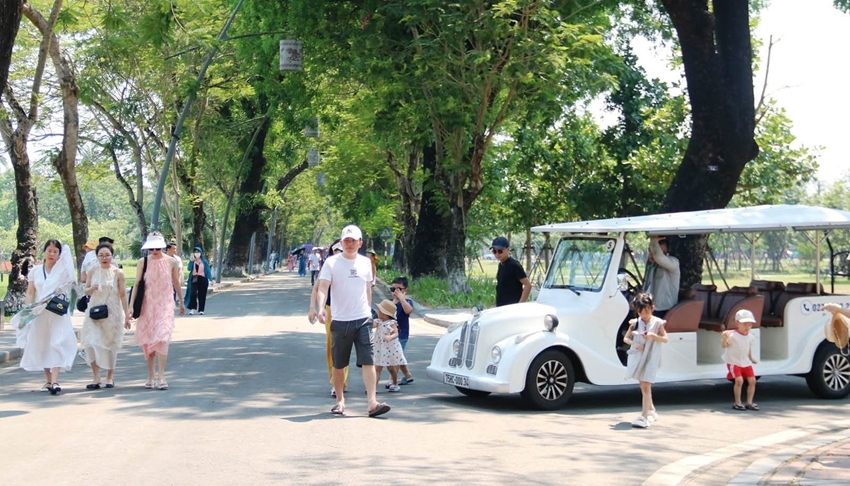 Tourists visiting attractions in Hue