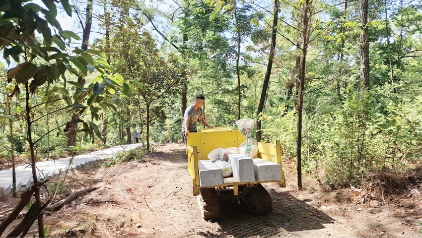 Transporting materials up Mount Kim Phung